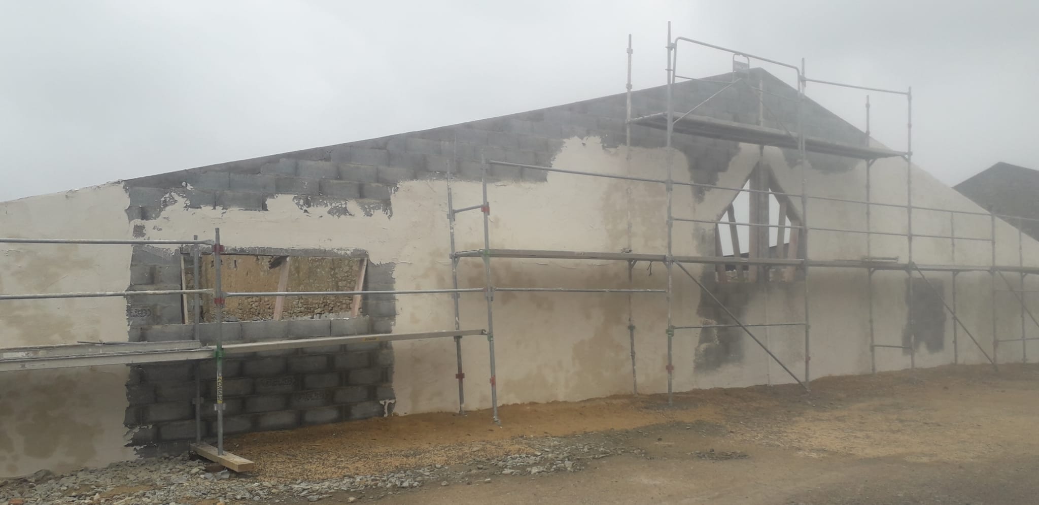 Rénovation du mur avec parpaing avant enduit